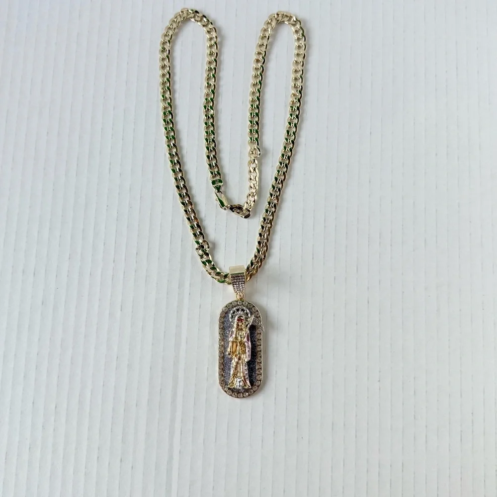 Chain‎ 24”of man with holy death medal. Laminated gold New